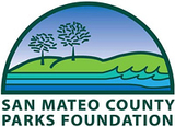 Half circle logo that reads San Mateo County Parks Foundation and has some waves, grass and trees