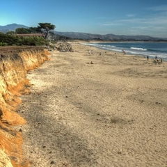 View of cliff, sand, and beach