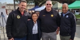 Supervisor Mueller with Sheriff Corpus and officers